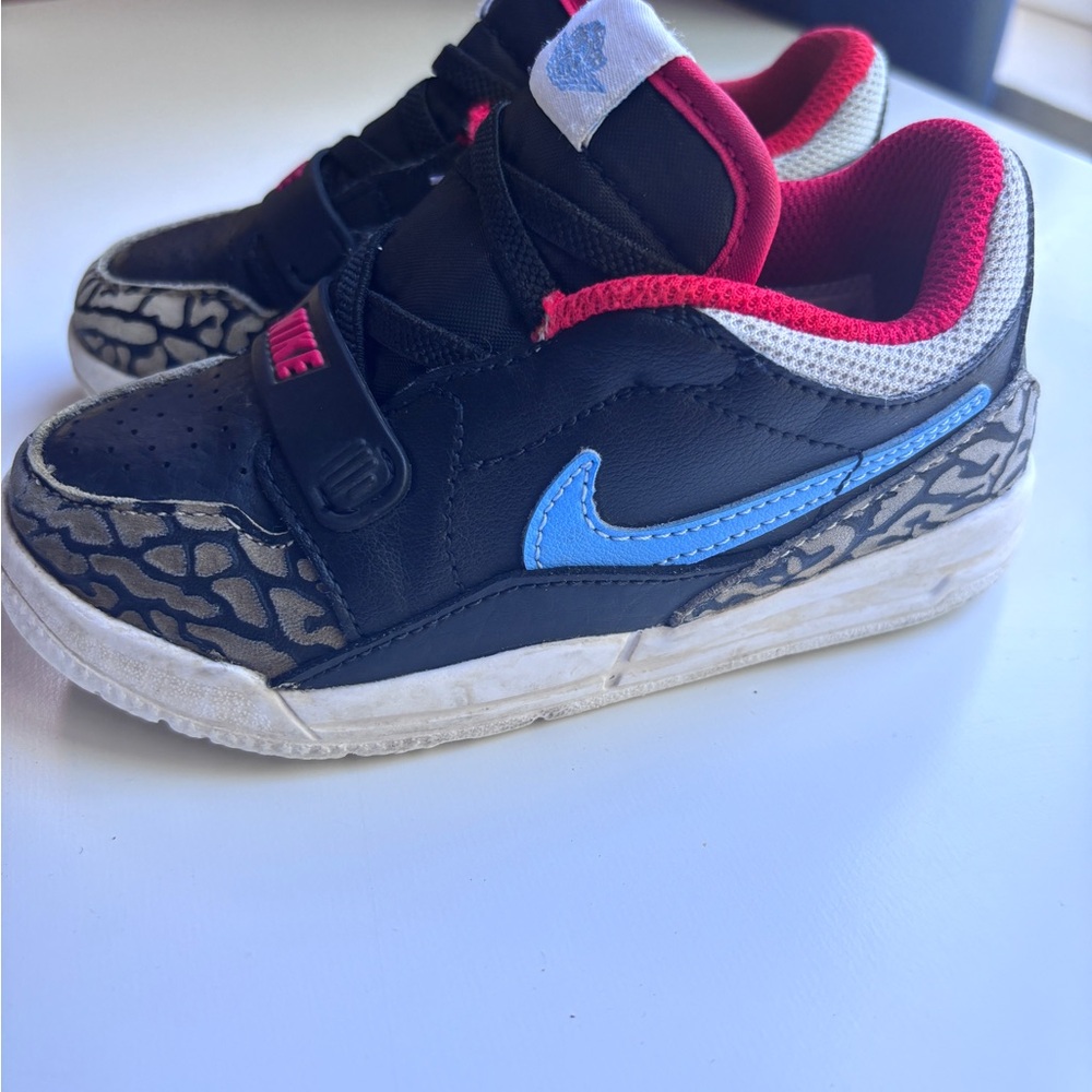 Nike Kids Black and Blue Sneakers with Red Accents